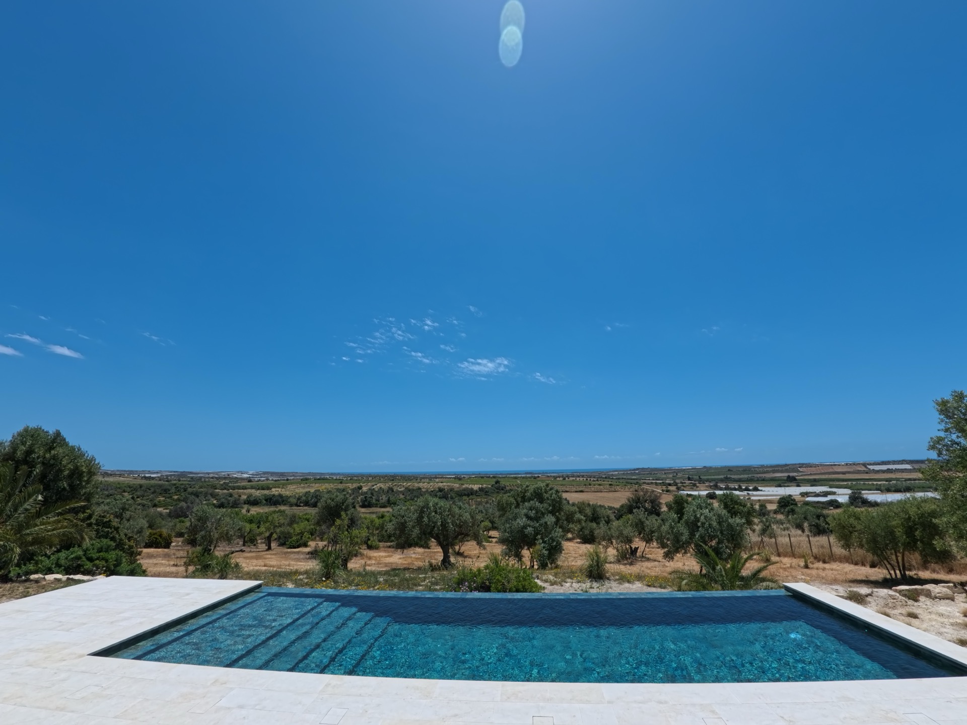 View across the landscape towards the Vendicari salt flats and coast